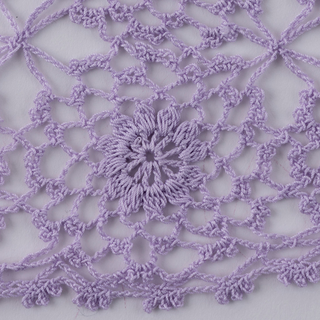 Pattern for knitting a mini shawl using motifs