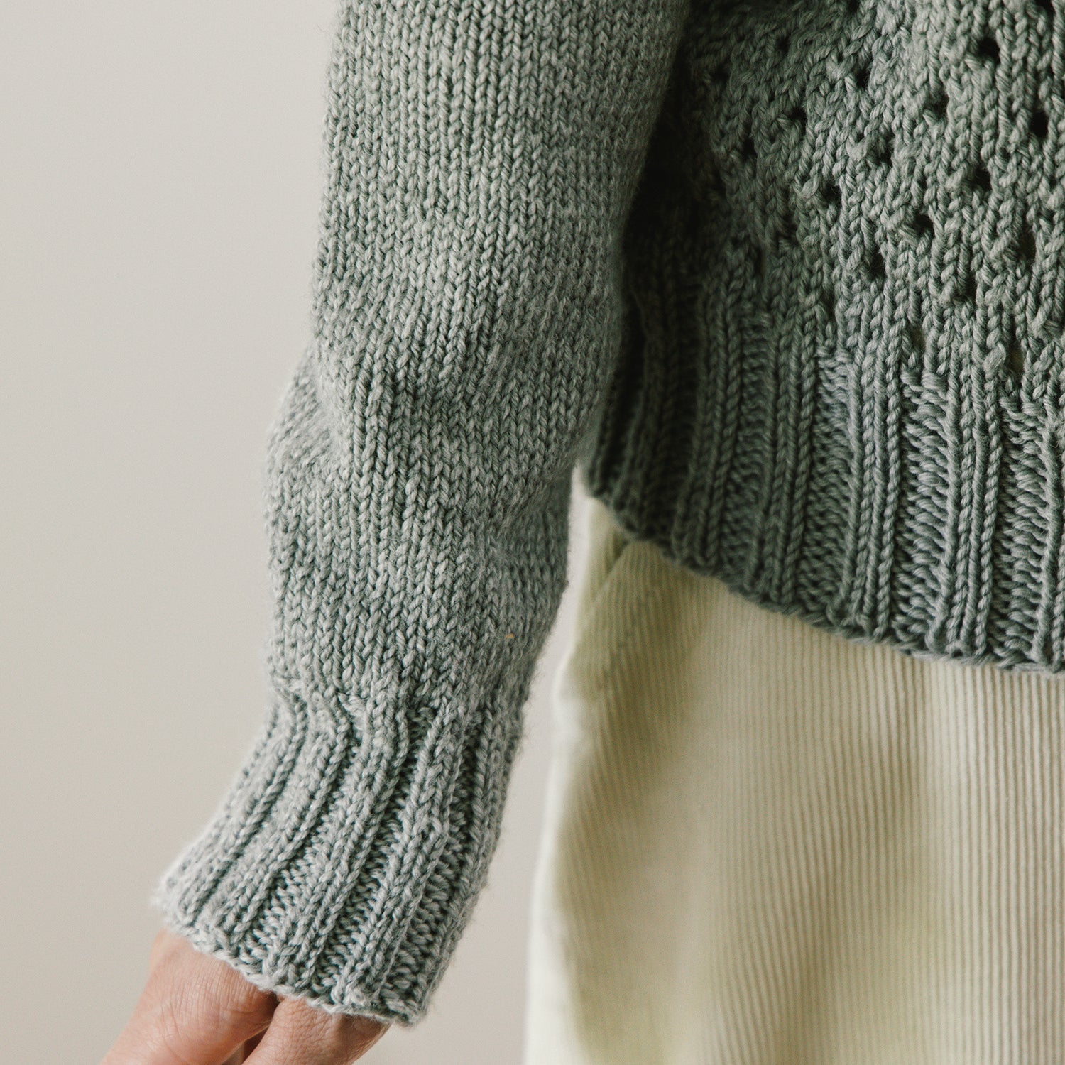 Pattern for knitting a winter sweater with slim sleeves